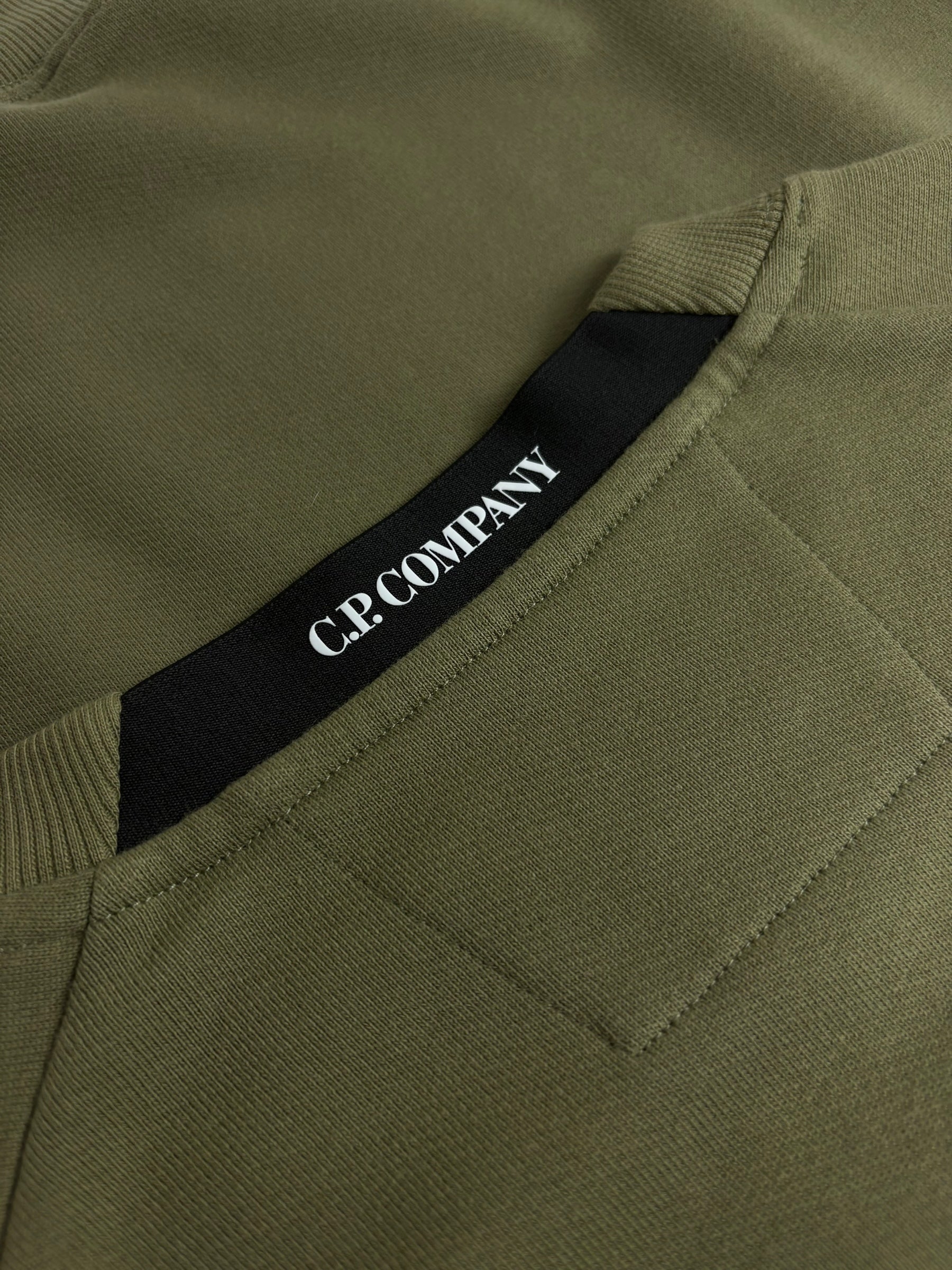 Sweat C.P Company kaki taille M - Logo et étiquette