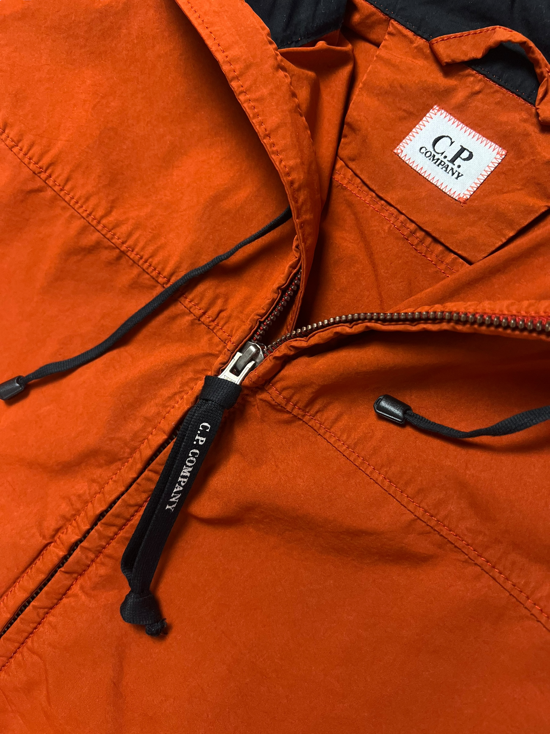 Veste C.P Company orange taille L - Logo et étiquette
