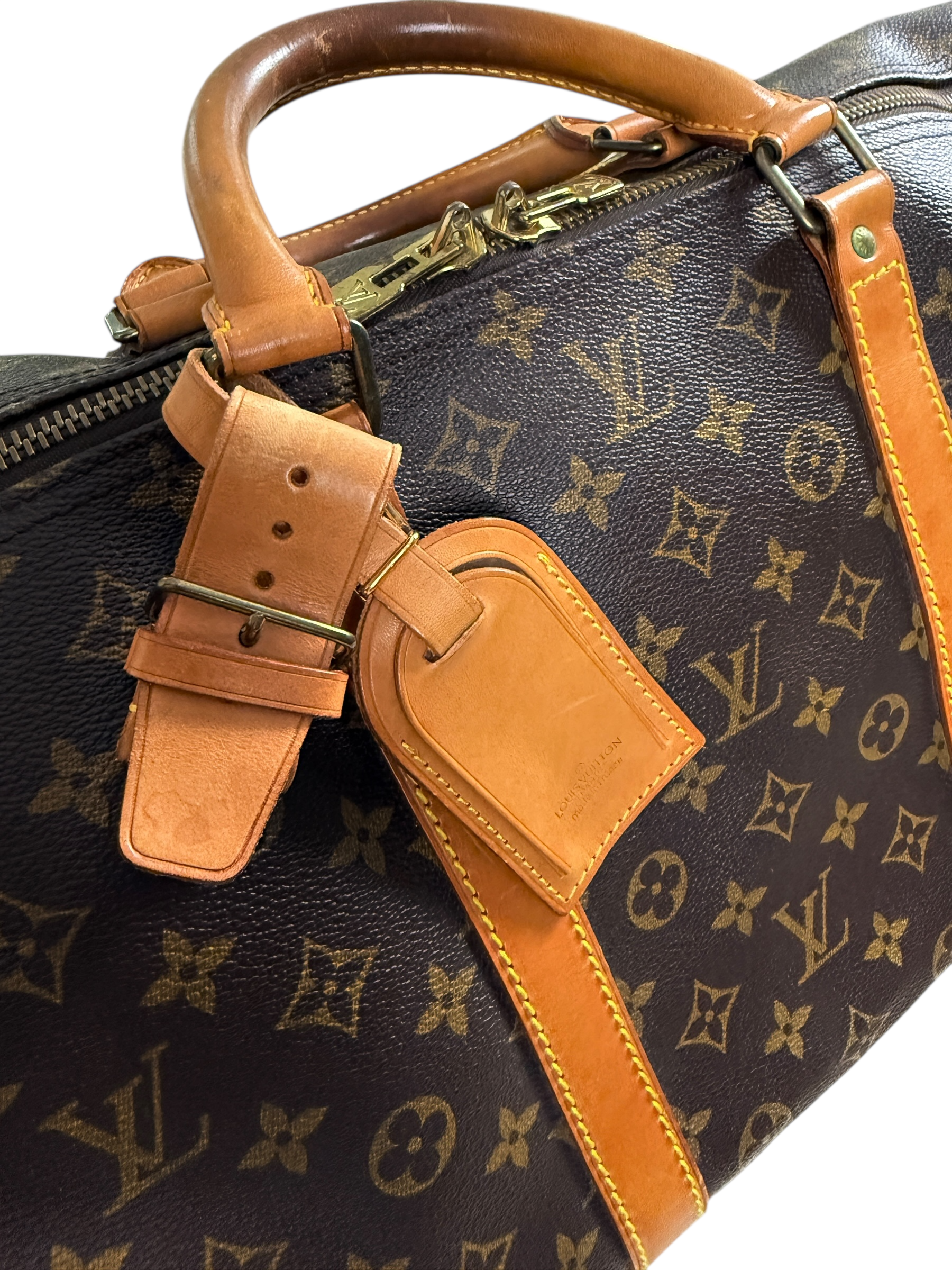 Sac Louis Vuitton marron taille 60 - Logo et étiquette