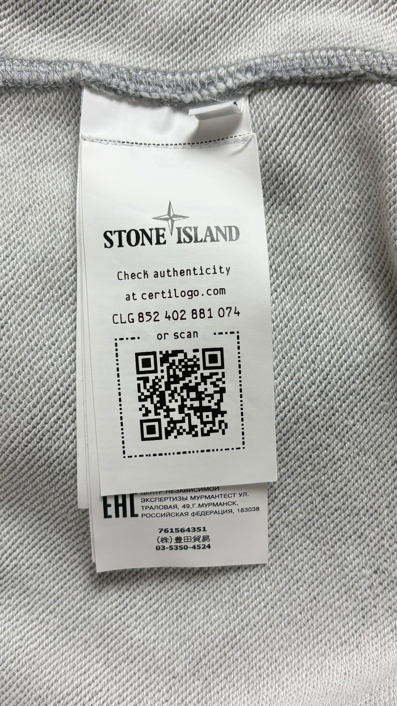 Gilet Stone Island gris taille L - Logo et étiquette