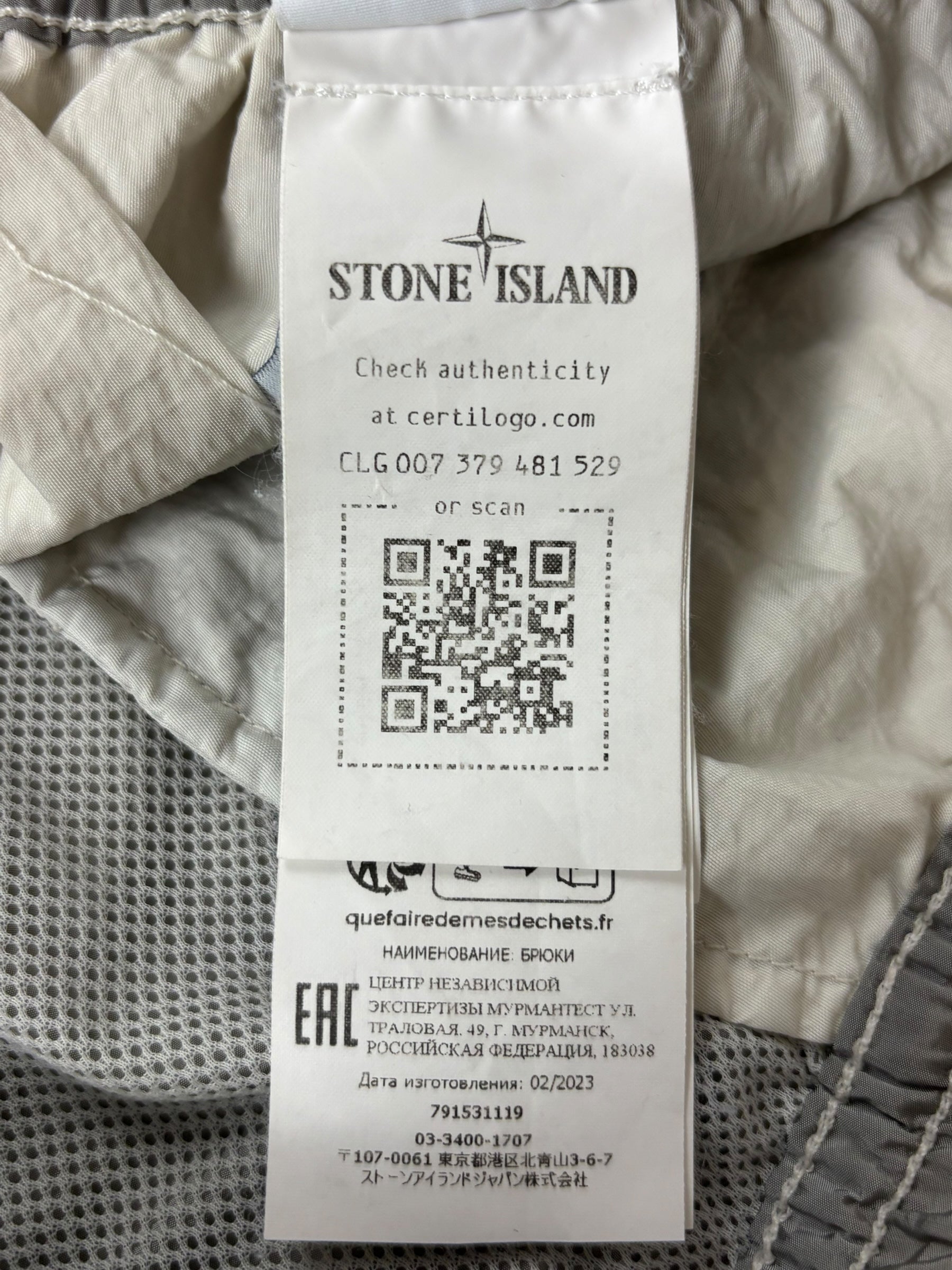 Pantalon Stone Island gris clair taille PANTALON W34 - Vue côté