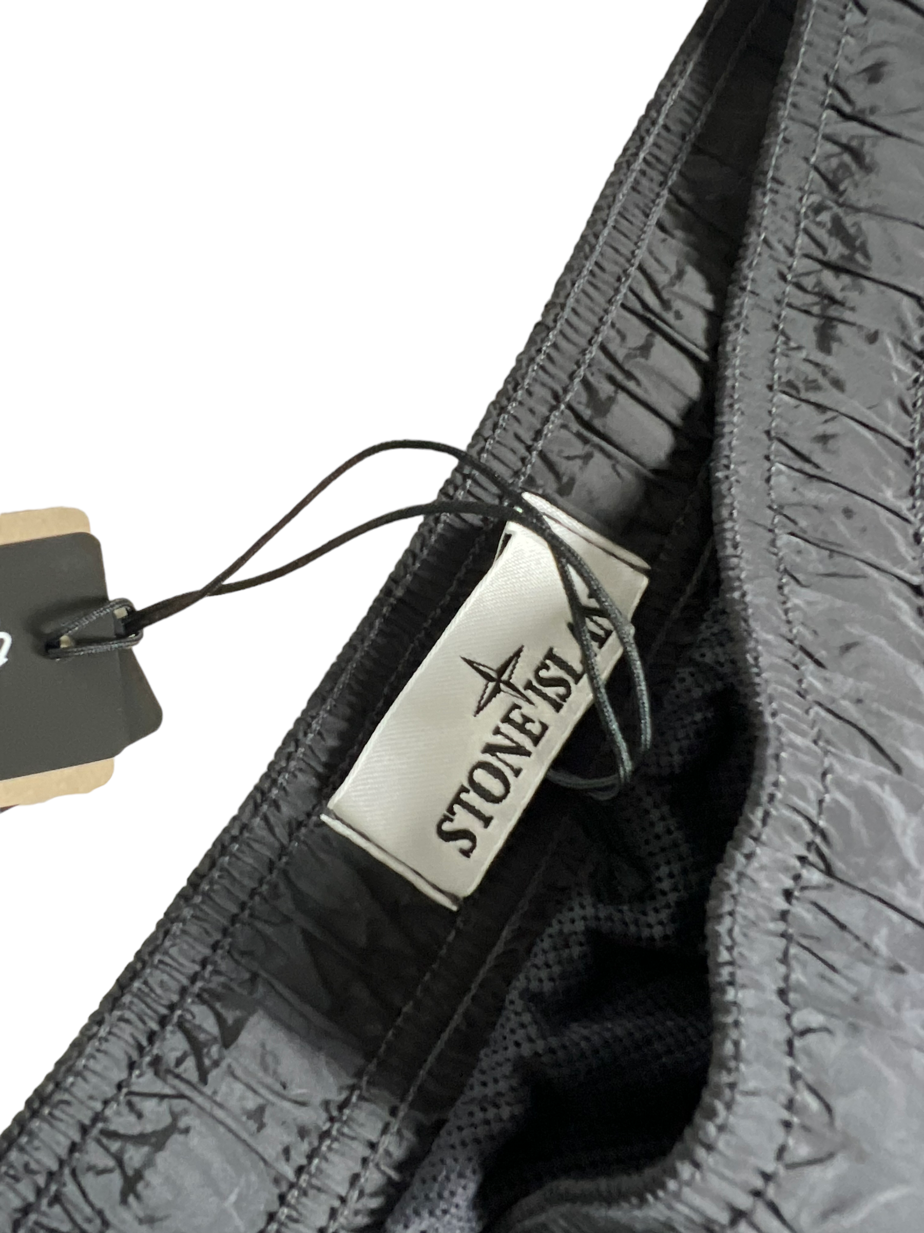 Short Stone Island gris taille S - Logo et étiquette