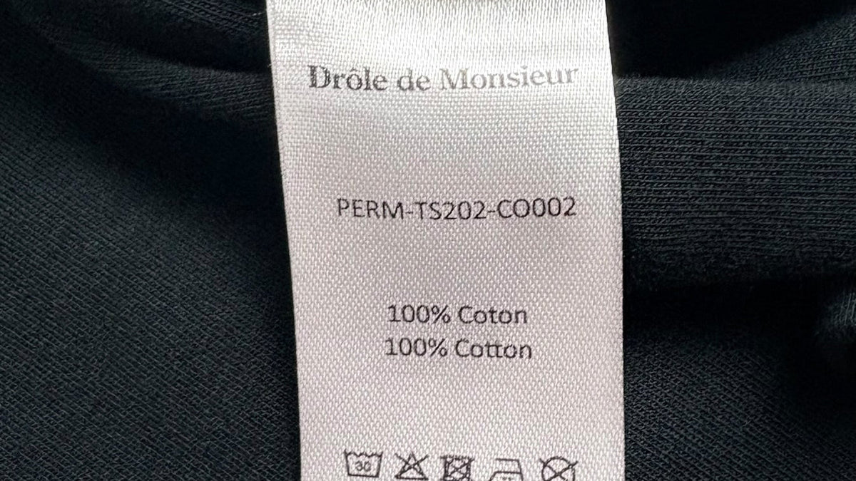 Détail d'un tee-shirt Drôle de Monsieur Slogan Classique noir, qualité de l'impression et du coton