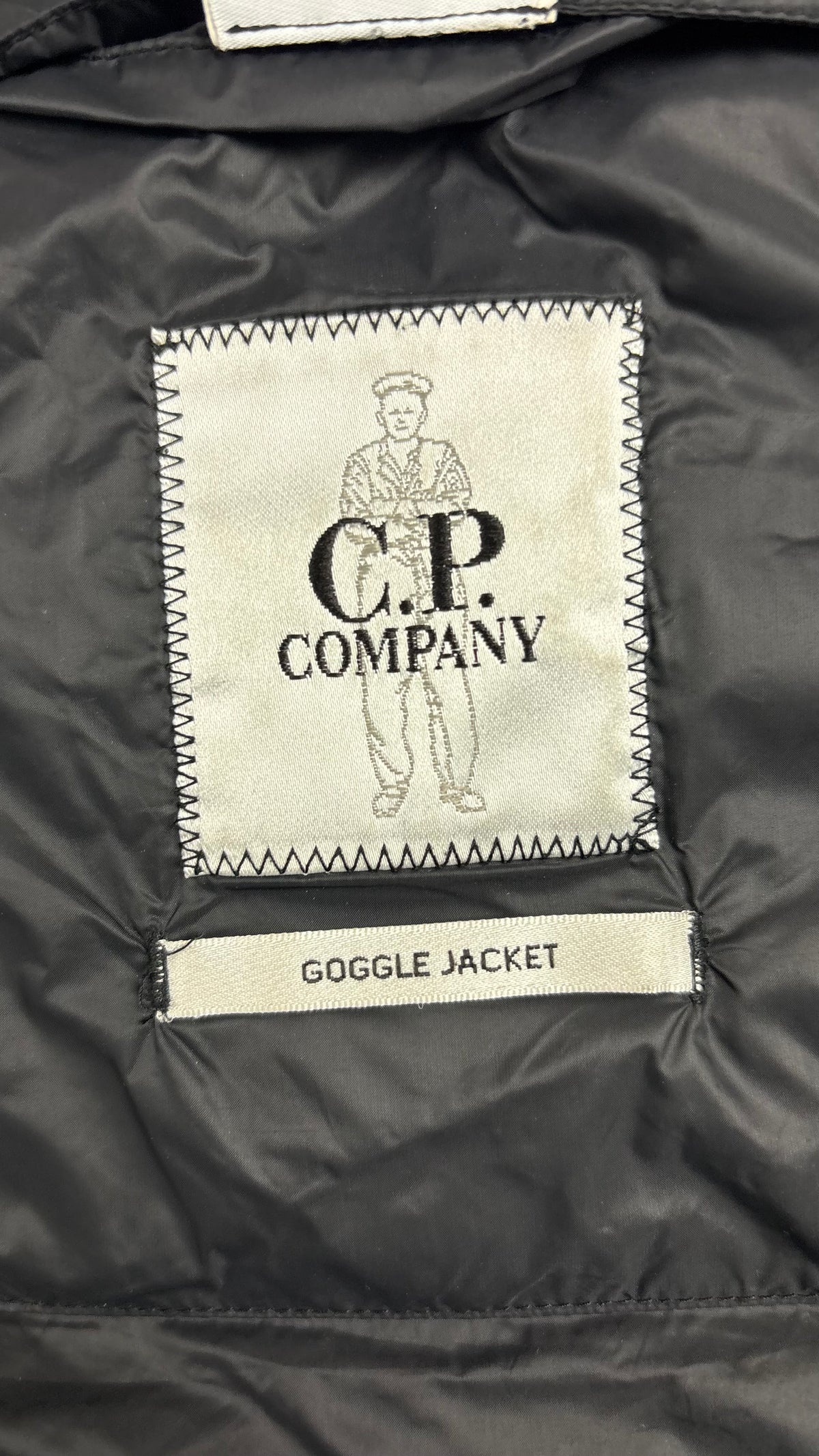 Doudoune C.P Company Goggle Maille vert taille 46, détail étiquettes et finitions — vue 4
