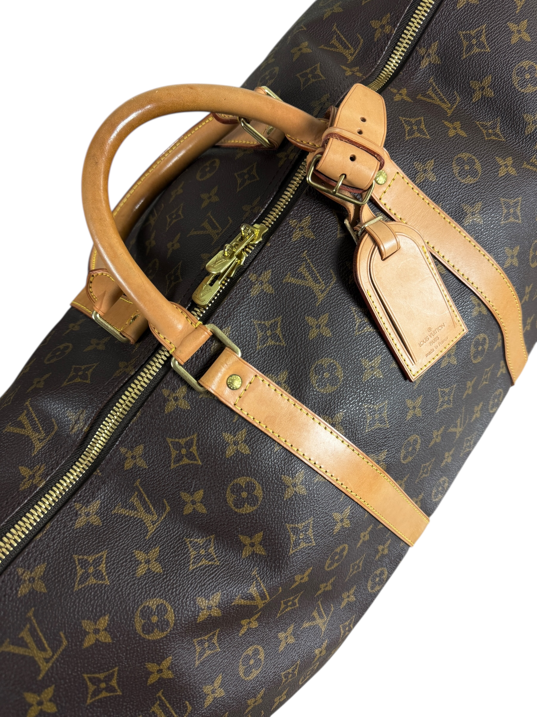 Sac Louis Vuitton marron taille 60 - Vue côté