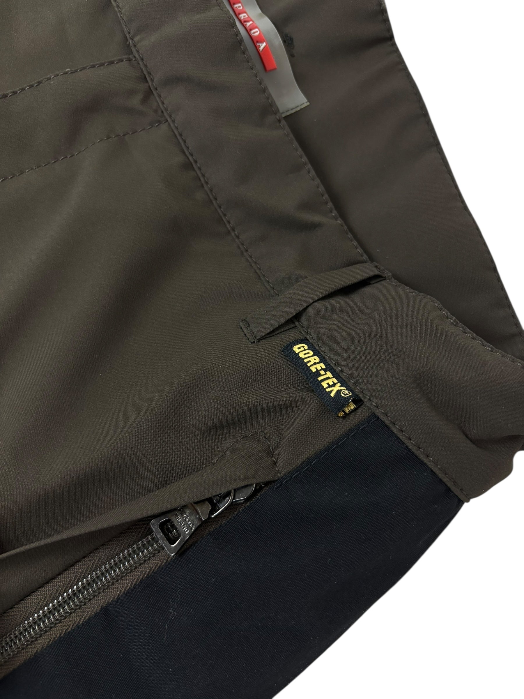 Pantalon Prada marron / noir taille PANTALON 48 - Logo et étiquette