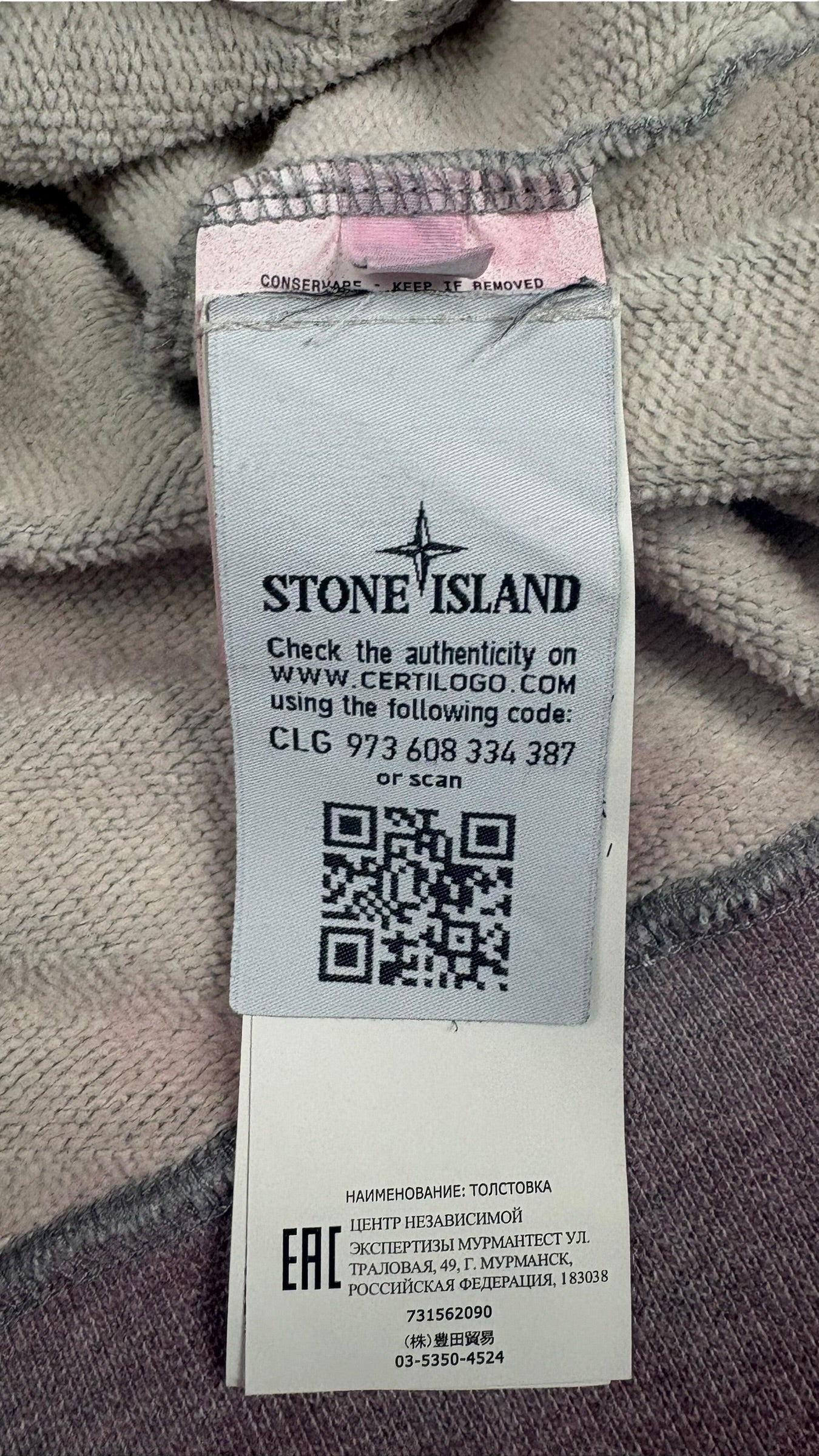 Hoodie Stone Island rose taille L - Logo et étiquette