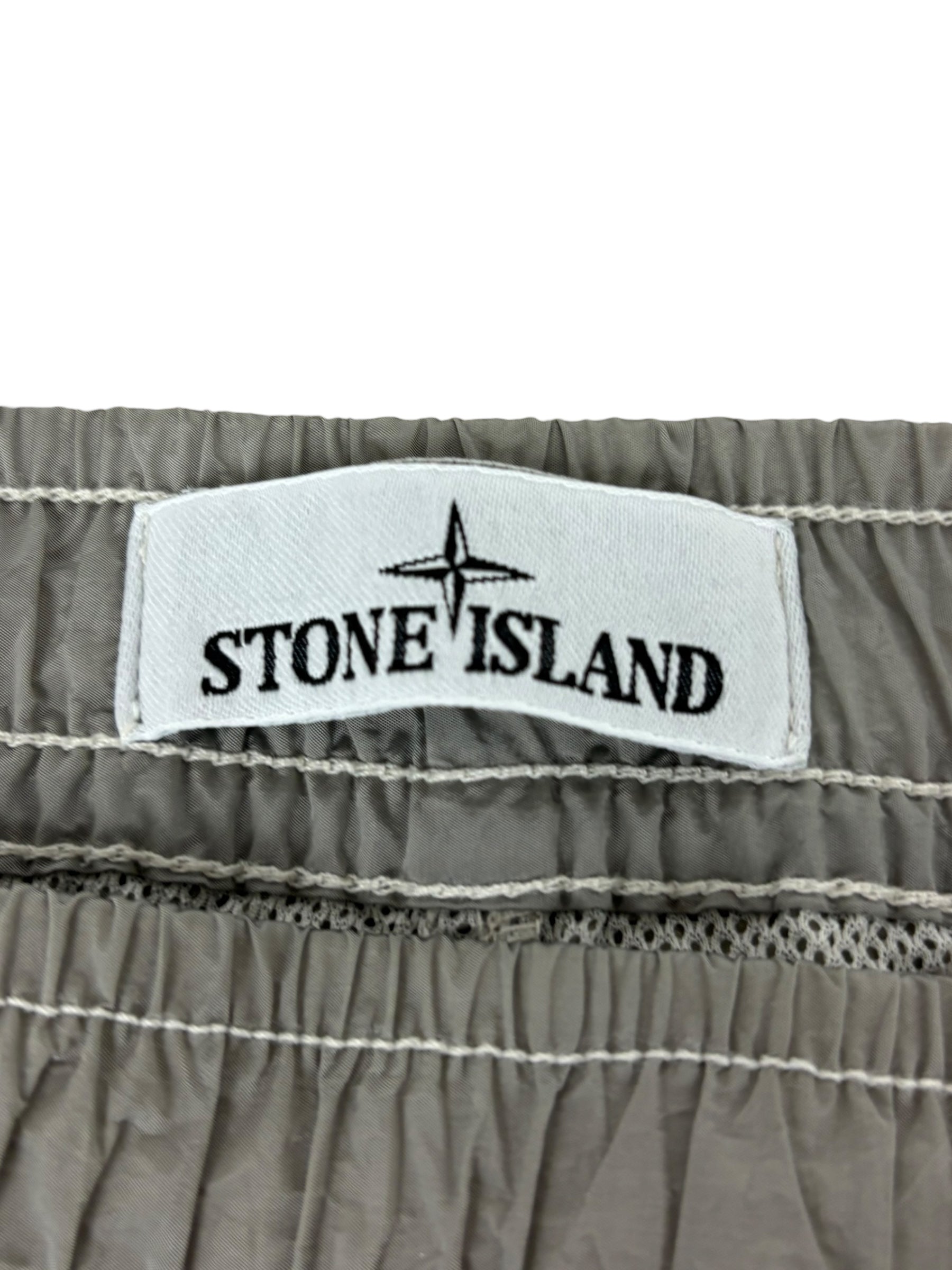 Pantalon Stone Island gris clair taille PANTALON W34 - Logo et étiquette