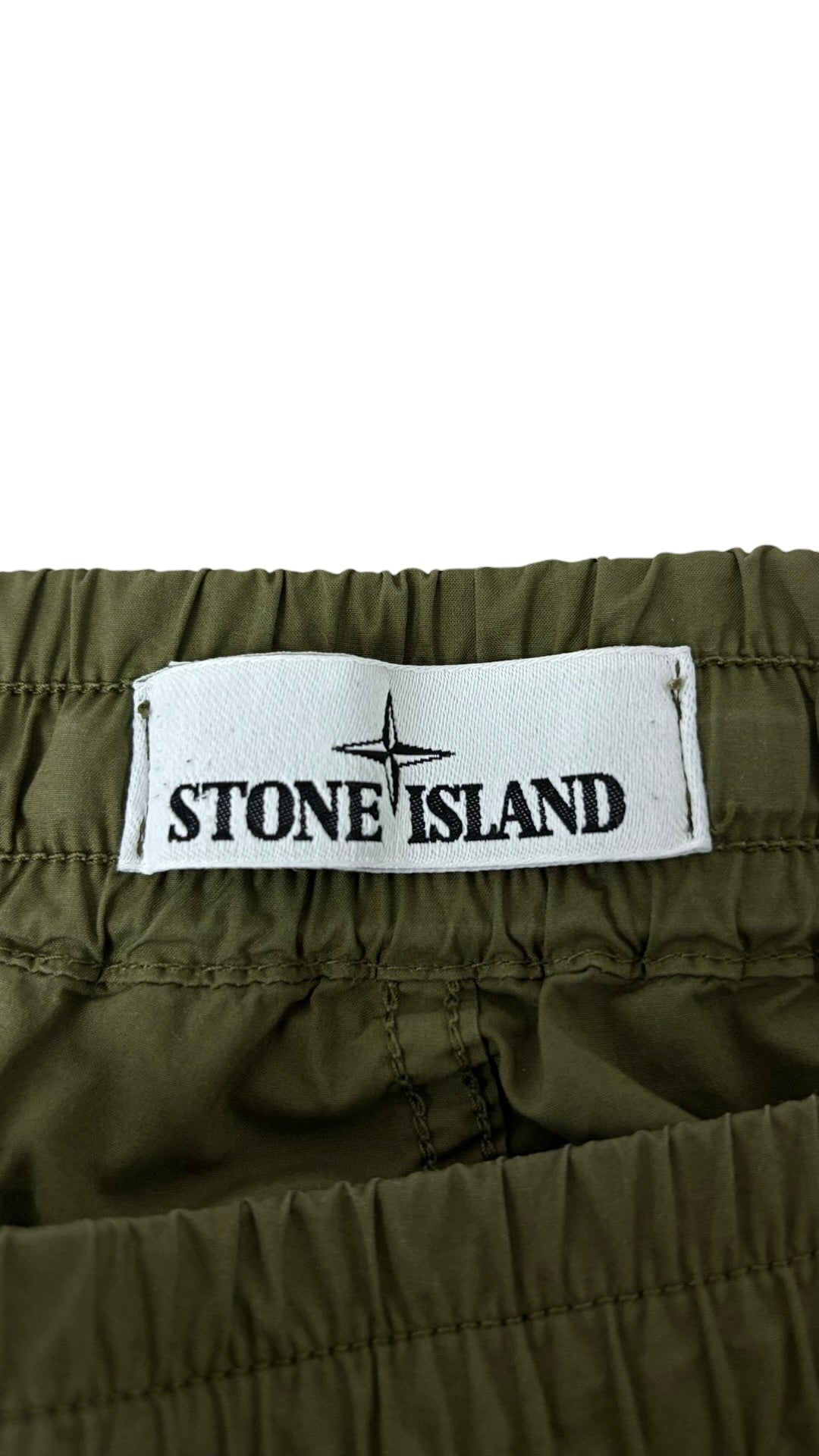 Pantalon Stone Island kaki taille W34 - Logo et étiquette