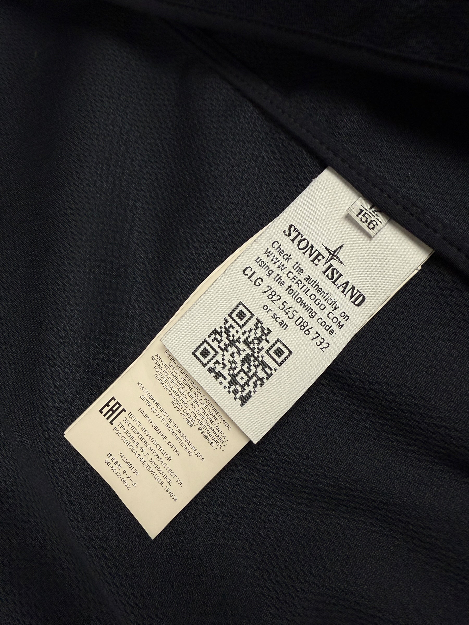 Veste Stone Island marine taille 12 ans - Logo et étiquette